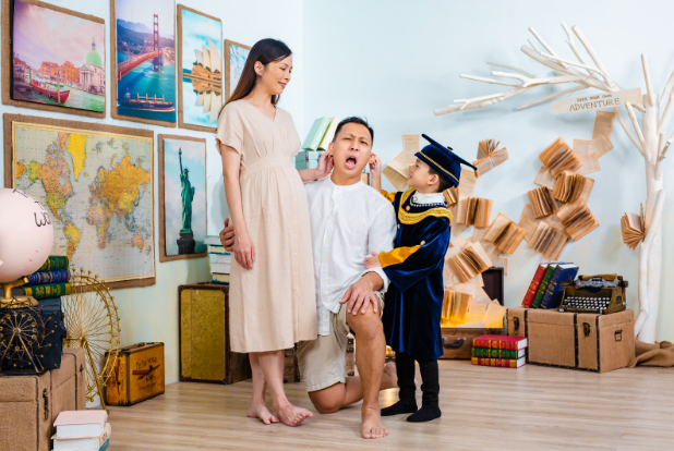 family silly photo session for child's graduation
