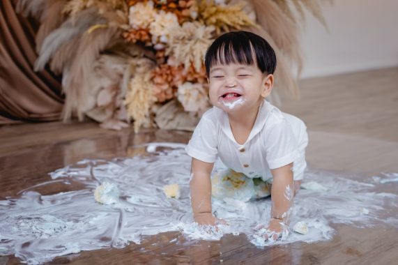 Cake Smash Photoshoot - Boy Smiling After Smashing Cake