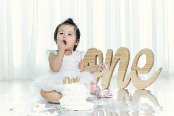Cake Smash Photoshoot - Girl Enjoying Cake