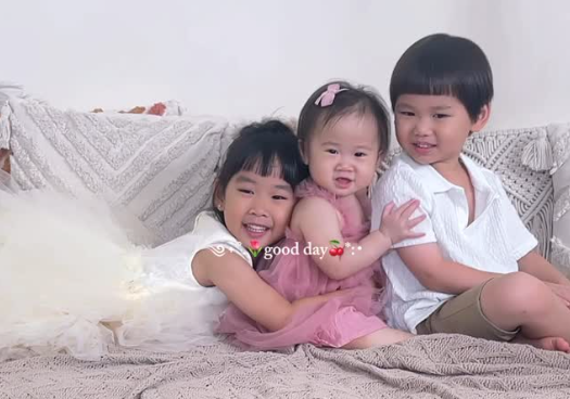 siblings hugging during photoshoot