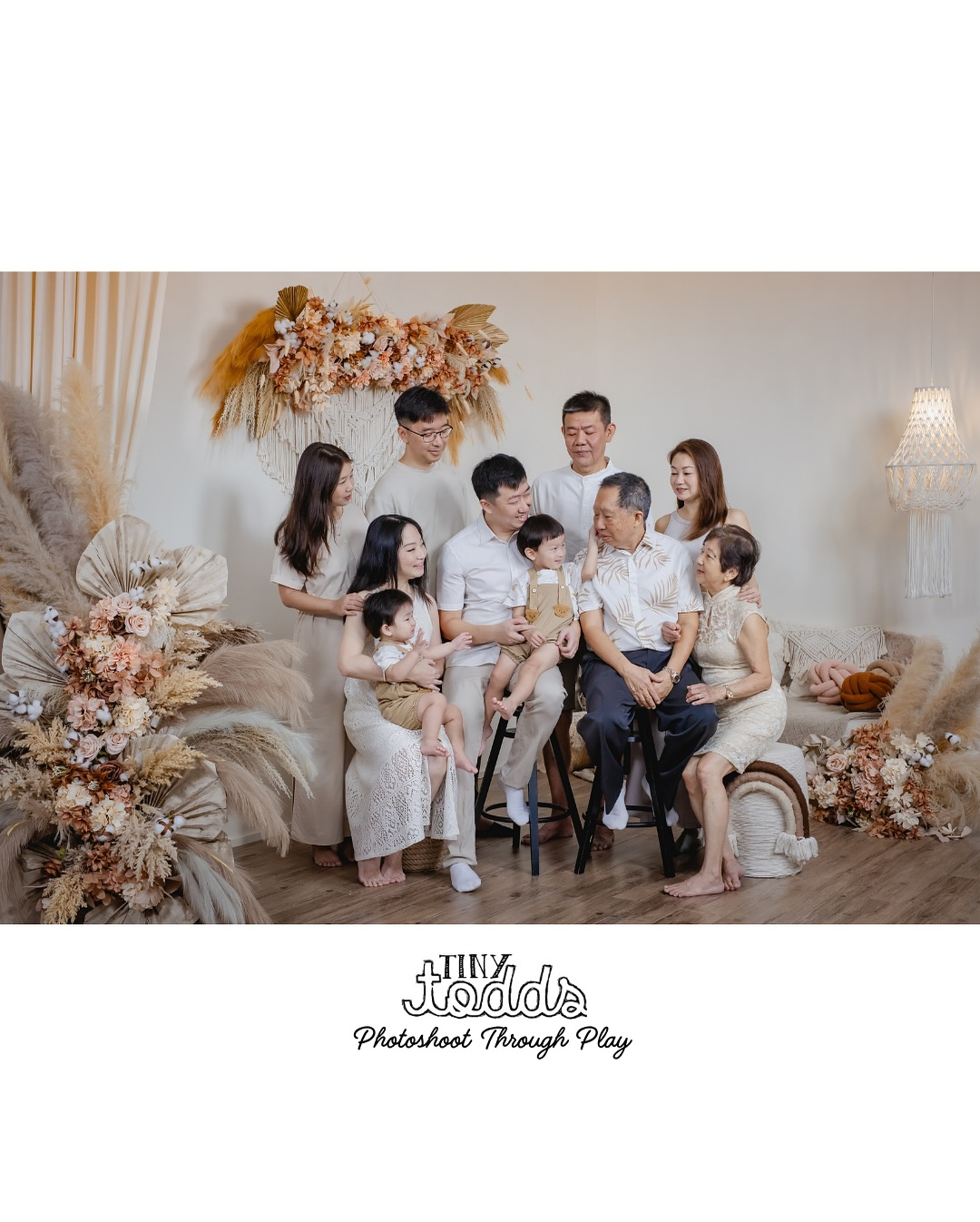 multi generation family posing together in a family photoshoot studio