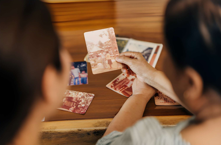 A couple looking at pictures