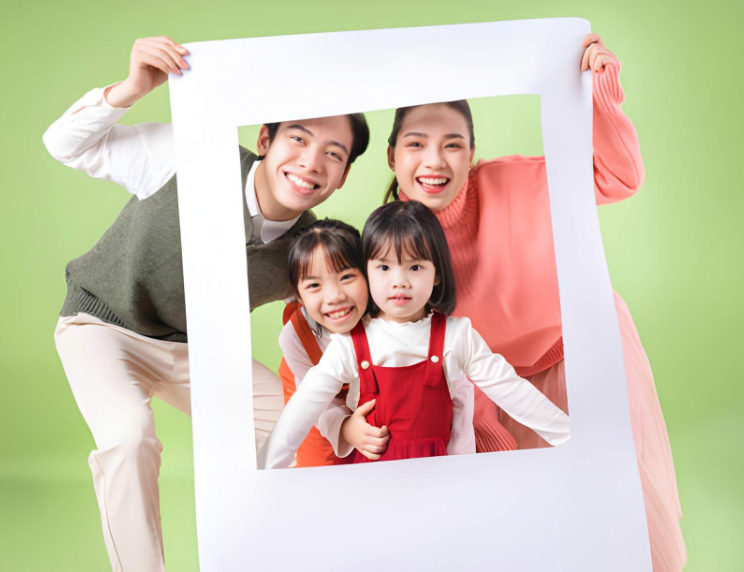 A couple with their two daughers