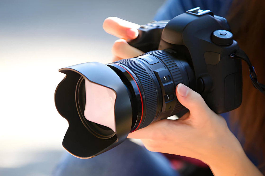 A person holding a camera