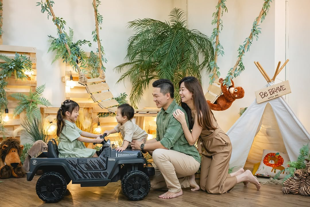 family of four in a safari theme photoshoot